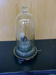 BELL IN VACUUM