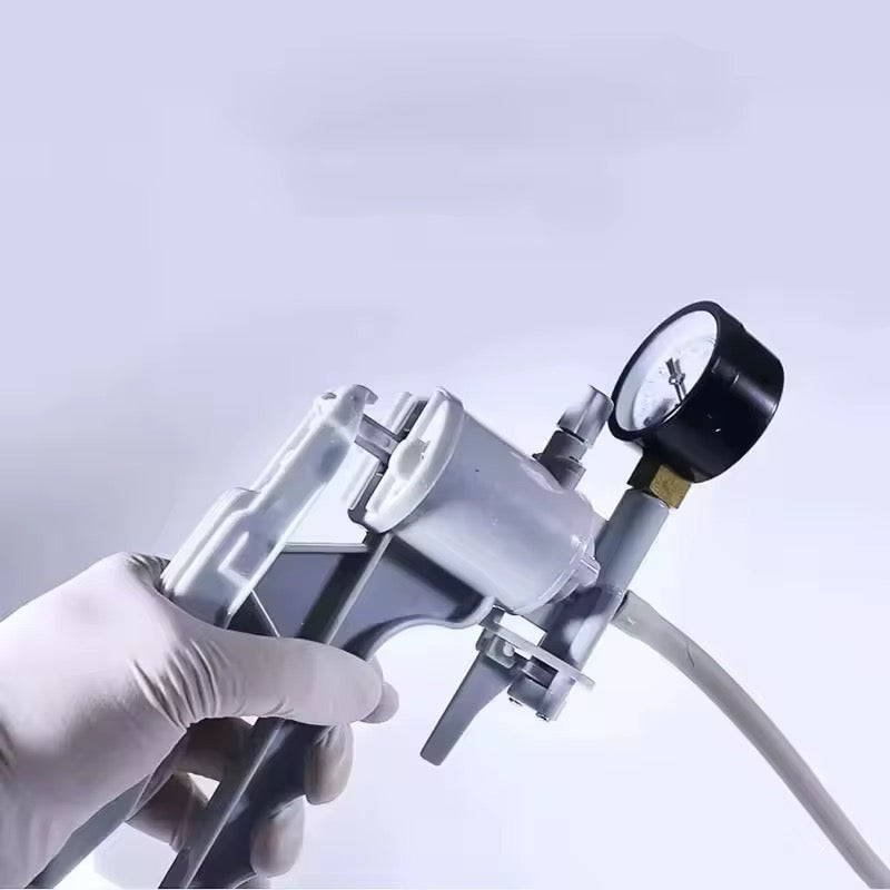 Manual filtration pump with gauge