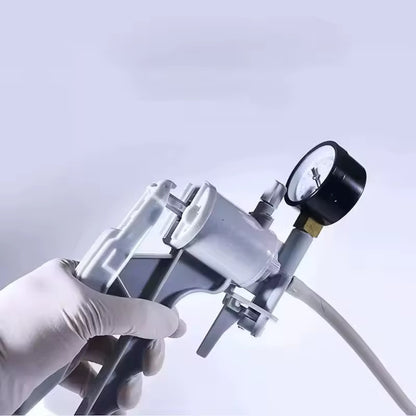 Manual filtration pump with gauge