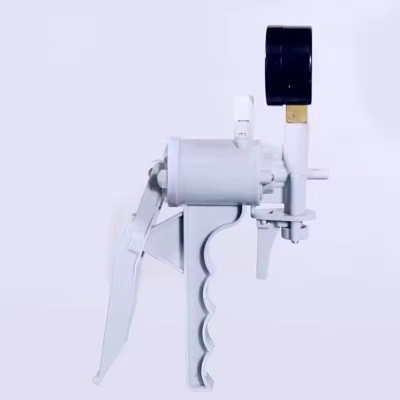 Manual filtration pump with gauge