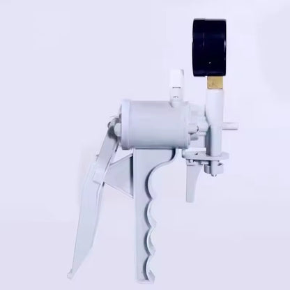 Manual filtration pump with gauge